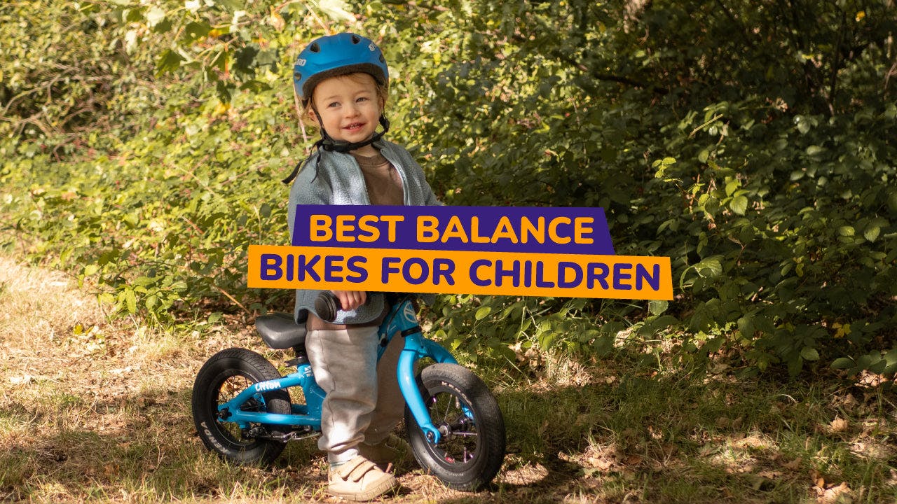 child on a balance bike - bike club