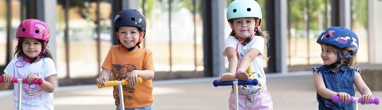 young children with scooters